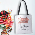 Elegant Script Just Married Rose Gold Honeymoon Tote Bag<br><div class="desc">Celebrate your newlywed bliss with our Elegant Script Just Married Rose Gold Logo Honeymoon Tote Bag. This chic and customizable tote features a graceful "Just Married" rose gold script logo, with the option to personalize it with your last name and wedding date below. Perfect for your honeymoon or any romantic...</div>