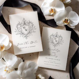 Elegant script monogram crest save the date