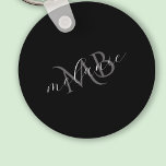 Elegant Script Name Monogram Initials Black Keychain<br><div class="desc">Elegant Script Name Monogram Initials Black   Modern and stylish. Personalise with your name in a stylish script overlaid on top of your initials.</div>