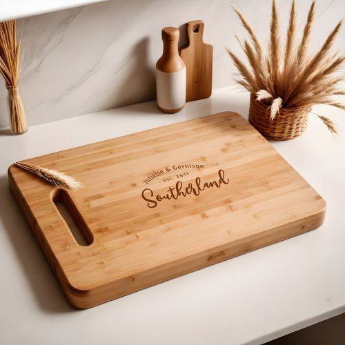 Elegant Script Personalized Family Name  Year Cutting Board
