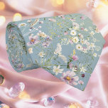 Elegant Serene Blue Floral Necktie<br><div class="desc">Complete your wedding ensemble with our Elegant Serene Blue Floral Wedding Necktie. This sophisticated necktie features a serene blue background adorned with delicate watercolor flowers in soft pastel hues, perfectly complementing the elegant theme of your wedding. The vintage-inspired floral design adds a touch of timeless charm, making it an ideal...</div>