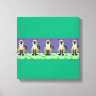 Elegant Siamese Cats in the Grass Canvas Print