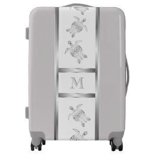 Elegant Silver Turtles And Monogram Luggage