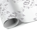 Elegant Silver Wedding Rings Wrapping Paper<br><div class="desc">Elegant Silver Wedding Ring Gift Wrapping paper. Made with high resolution vector graphics for a professional print. NOTE: (All zazzle product designs are "prints" unless otherwise stated) If you have any questions about this product please contact me at siggyscott@comcast.net or visit my store link: http://www.zazzle.com/designsbydonnasiggy?rf=238713599140281212 (Copy and Paste) I'll be...</div>
