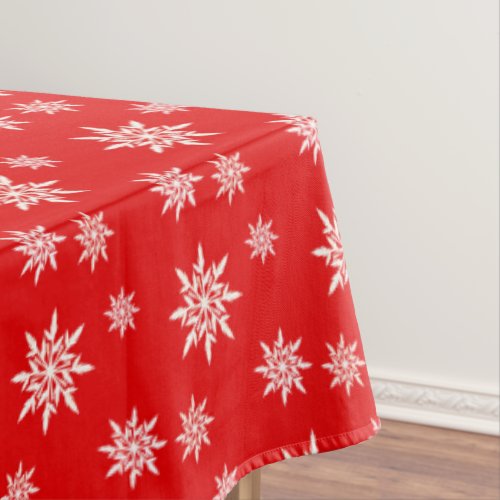 Elegant snowflakes on red tablecloth