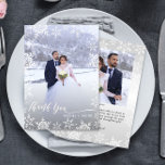 Elegant Snowflakes & Script 2-Photo Winter Wedding Thank You Card<br><div class="desc">This wedding thank you card design features elegant script typography & snowflakes with space for 2 photos and a custom message on the back. Click the customize button for more flexibility in modifying the text or moving the graphics! Variations of this design as well as coordinating products are available in...</div>