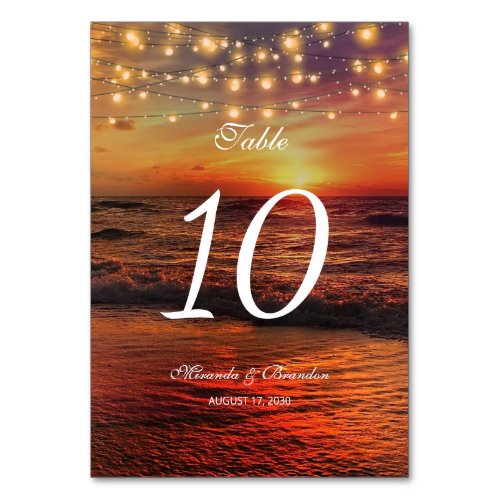 Elegant Sunset Beach Lights Summer Wedding Table Number