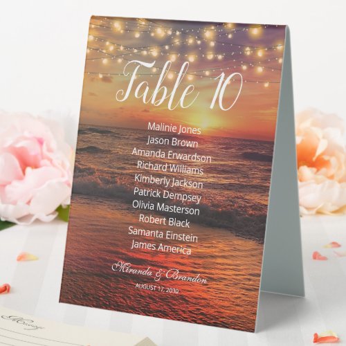 Elegant Sunset Beach String Lights Seating Chart Table Tent Sign