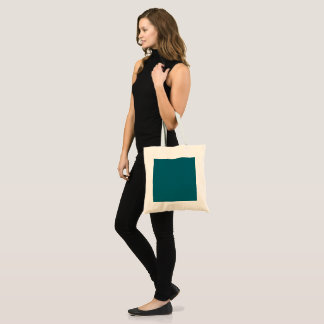 elegant teal blue color creates tote bag