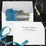 Elegant Turquoise Blue Reflecting Rose Wedding Envelope<br><div class="desc">These beautiful wedding envelopes are perfect for making your invitations all the more special. They feature a romantic design on the inside flap with a single long-stemmed sky blue, turquoise, or azure colored rose reflecting with waves and ripples. The back flap has your return address in lacy script calligraphy. Sophisticated...</div>