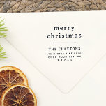 Elegant Typography Merry Christmas Return Address Rubber Stamp<br><div class="desc">This wooden stamp design features "merry christmas" or a custom greeting written over two lines in classic lowercase serif typography. Below, your family name is printed in capitals. Your return address or contact details appear underneath in a simple typography layout. Made to match our Our Year Minimalist 12 Photo Collage...</div>