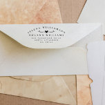 Elegant Typography Two Last Names Wedding Address Rubber Stamp<br><div class="desc">This minimal return address stamp features two names and two last names in modern elegant serif typography, joined by a heart with whimsical lines. The name above is arched. Below there is a return address in smaller simple lettering. This stamp is perfect for an unmarried or married couple with different...</div>
