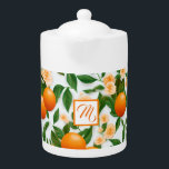 Elegant Valencia Orange and Blossom Teapot<br><div class="desc">Elegant Valencia Orange and Blossom Teapot - Citrus Themed Tea Time Essential Indulge in a delightful tea experience with this exquisite Valencia Orange and Blossom Teapot. Featuring a bright and cheerful orange blossom design, this teapot is perfect for adding a splash of color to your kitchen or dining space. Whether...</div>