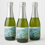 Elegant Vibrant Teal Peacock Feather Wedding Favor Sparkling Wine Label<br><div class="desc">Say thank you to your wedding guests: Here comes your custom give-away mini sparkling wine label with your personalized details and decorated with a stunning peacock feather ornament with vibrant colors. An original design available exclusively at ©GardenEden online store.</div>
