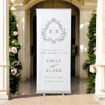 Elegant Vintage Monogram Crest Wedding Welcome Retractable Banner<br><div class="desc">With classic elegance, this tall retractible banner wedding welcome sign features a decorative Victorian crest with the bride and groom's monogram initials. It has a look of luxury with its formal crest that serves as a wedding logo for the bride and groom. The monochromatic color scheme in black and white...</div>