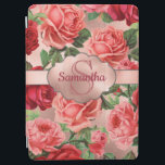 Elegant Vintage Pink Red Roses Floral Monogrammed iPad Air Cover<br><div class="desc">Chic, Elegant, Vintage, Pink, Pale violet red, roses floral name iPad Cover. Romantic, girly design an elegant vintage floral pink, pale violet red roses with green leaves pattern on rose gold background, with rose gold label. You can customize with your name and monogram. If you do not need personalize you...</div>