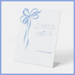Elegant Watercolor Dusty Blue Bow Cards and Gifts Pedestal Sign<br><div class="desc">Designed for the modern bride with a love for timeless elegance, this Cards & Gifts sign offers a refined way to direct guests as they arrive. Featuring a delicate hand-painted blue bow and sophisticated typography, this sign subtly enhances the overall aesthetic of a bridal shower, engagement party, or wedding reception,...</div>
