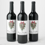 Elegant Watercolor Pines Calligraphy Ink Christmas Wine Label<br><div class="desc">Modern Elegant Calligraphy Ink Script Watercolor Pines Winter Greenery with Burgundy Red Ribbon Bow Christmas Ornaments,  Pine Cones and Holly Berries Merry Christmas Wine Bottle Label</div>