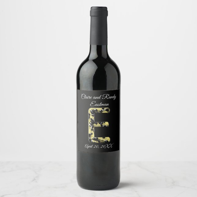 Elegant Wedding Black and Gold Letter E Monogram Wine Label (Front)