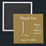 Elegant Wedding Gold Silver Letter L Monogram Magnet<br><div class="desc">This magnet is an elegant thank you gift for your bridal party or a unique wedding favor for your guests. The bride and groom's monogram is sophisticated and is accompanied by the happy couple's names and wedding date. The background offers a deep gold solid color to support your text. The...</div>