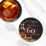 Elegant Whiskey Black Gold 60th Birthday Party Round Paper Coaster<br><div class="desc">Elegant Whiskey Black Gold 60th Birthday Party Round Paper Coaster. Raise a toast to elegance with our milestone birthday invitation design, a perfect blend of sophistication and celebration. The black and gold accents set the stage for a classy affair, reminiscent of aged whiskey in its rich hues. This invitation exudes...</div>