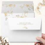 Elegant White and Gold Gilded Detail Wedding Envelope<br><div class="desc">Elegant white wedding envelope with exquisite faux foil gilded floral details inside! Design coordinating our "White and Gold Enchanting and Celestial" collection invites. Envelope with elegant return address and named on back top flap with faux gilded element. Design with option to add or erase name(s) and address on top back...</div>