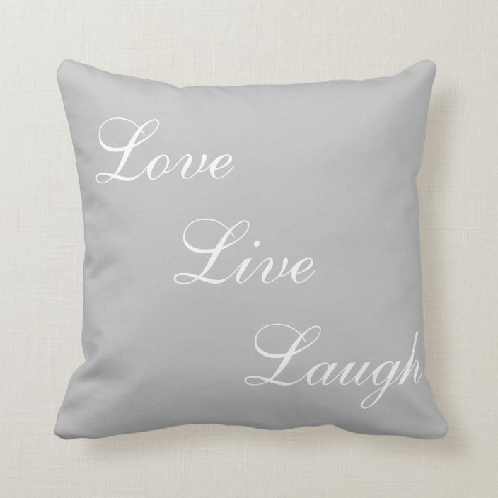 Elegant white calligraphy on light grey throw pillow