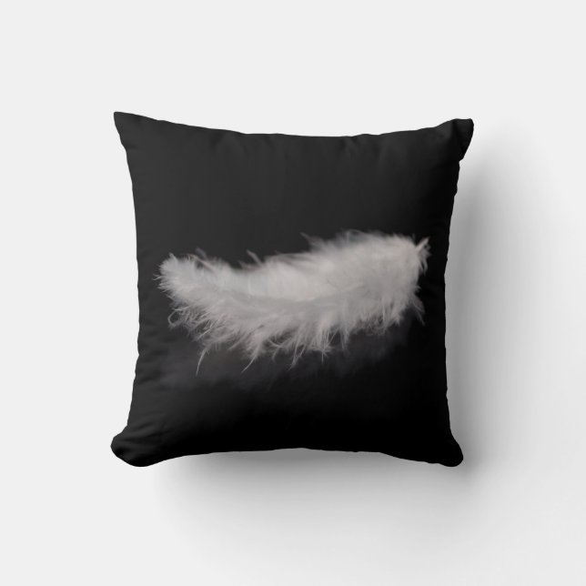 Elegant White Feather on a Black Background Throw Pillow (Front)