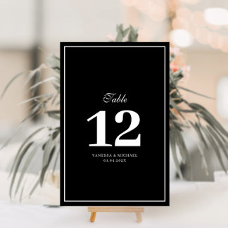 Elegant white frame wedding table number