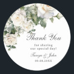 Elegant White Ivory Roses Floral Wedding Bridal Classic Round Sticker<br><div class="desc">Personalize these elegant floral round stickers easily and quickly. Simply click the customize it further button to edit the texts,  change fonts and fonts colors. Featuring a beautiful white ivory roses floral arrangement. Matching items available in store. (c) Somerset Fine Paperie</div>