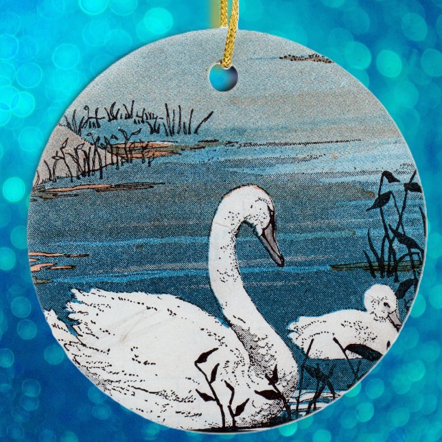 Elegant White Mother Swan with Baby in Blue Lake Ceramic Ornament (Beautiful white swan swimming with baby in blue lake on hanging ornament.)