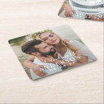 Elegant White Mr and Mrs Monogram Photo Wedding Square Paper Coaster<br><div class="desc">Elegant wedding coasters feature a photo of the bride and groom with white text overlay. Custom wording includes "Mr and Mrs" in modern calligraphy script with custom married last name and wedding date text in classic serif typestyles.</div>
