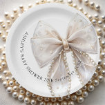 Elegant White Pearl Bow Baby Shower Paper Plates<br><div class="desc">This item is a timeless and elegant design featuring a soft beige color palette and a delicate bow as its centerpiece. Accented with pearlescent details,  it exudes grace and sophistication,  making it perfect for a chic and heartfelt celebration to baby shower. Matching items available.</div>