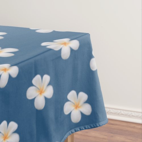 Elegant White Plumeria Flowers on Award Blue Tablecloth