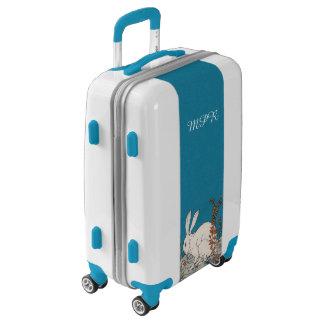 Elegant White Rabbit Sitting Among Flowers on blue Luggage