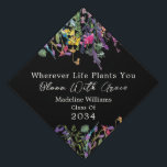 Elegant Wildflower Bloom With Grace Graduation Cap Topper<br><div class="desc">Lovely watercolor wildflowers and the saying Wherever Life Plants You Bloom With Grace saying make this graduation topper really stand out. The flowers are hand drawn and they have that meadow look to them that everyone loves. Pretty typography adds to the beautiful style. See coordinating items in our shop, Enchanted...</div>