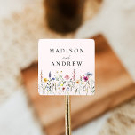 Elegant Wildflower Meadow Blush Pink Wedding Square Sticker<br><div class="desc">Elegant floral wedding stickers featuring a bottom border of watercolor wildflowers and foliage in shades of pink, yellow, purple, blue, and green with a blush pink background. Personalize the wildflower wedding stickers with your names or custom text. The personalized wildflower wedding stickers are perfect for sealing wedding envelopes, favor bags,...</div>
