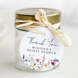 Elegant Wildflower Meadow Bridal Shower Thank You Favor Tags<br><div class="desc">Elegant floral bridal shower thank you favor tags featuring a bottom border of watercolor wildflowers and foliage in shades of pink, yellow, purple, blue, and green on a white background. Personalize the wildflower bridal shower favor tags with the bride-to-be's name. The personalized wildflower thank you favor tags are perfect for...</div>
