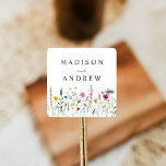 Elegant Wildflower Meadow Wedding Square Sticker<br><div class="desc">Elegant floral wedding stickers featuring a bottom border of watercolor wildflowers and foliage in shades of pink, yellow, purple, blue, and green on a white background. Personalize the wildflower wedding stickers with your names or custom text. The personalized wildflower wedding stickers are perfect for sealing wedding envelopes, favor bags, and...</div>