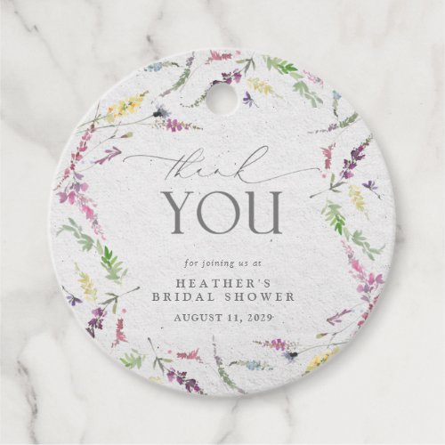 Elegant Wildflower Watercolor Floral Bridal Shower Favor Tags - Pretty and elegant, this bridal shower thank you tag features watercolor wildflower motifs in soft shades of blush pink, lilac and lavender, yellows, blues and delicate green botanical leaves, beautiful modern hand lettered calligraphy, and is easily personalized. Part of a co-ordinated suite. See full collection here: https://www.zazzle.com/collections/elegant_wildflower_watercolor_floral_bridal_shower-119635760261893795 contact designer for additional products. Copyright Elegant Invites, all rights reserved.