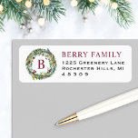 Elegant Winter Greenery Burgundy Monogram Wreath Label<br><div class="desc">Dress up your envelopes in style this holiday season!  This Christmas return address label features a winter floral greenery watercolor wreath framing a custom burgundy / wine red monogram initial along with elegant burgundy red last name text and dark gray return address text that can be personalized.</div>