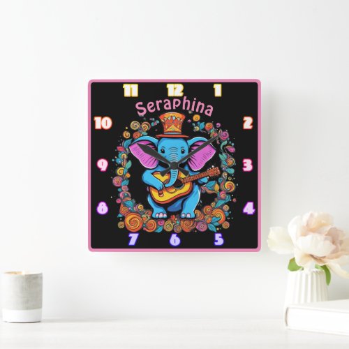 Elephant plays guitar in a flower field square wall clock