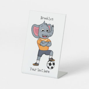 Elephant soccer player cartoon illustration pedestal sign