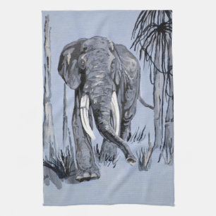 Elephant Strolling Through Wooded Savanna In Blue Towel