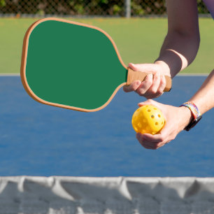 Elevate your Web Design with a Green Background Carbon Fiber Pickleball Paddle