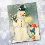 Elf and Snowman Vintage Christmas Postcard<br><div class="desc">One of Santa's elves holds a lighted candle up for a snowman to see in this delightful Victorian era art image. Celebrate the Holidays the old fashioned way!</div>