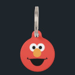 Elmo Face Art Pet ID Tag<br><div class="desc">Say "Hello!" to your keys or backpack! This bold and cheerful tag features the iconic, smiling face of Elmo on a bright red background. Perfect for distinguishing your keys, brightening up a backpack, or serving as a fun tag for a pet's collar, this accessory is a vibrant way to show...</div>