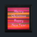 Embossed Colorful Stripes: Merry Christmas Happy N Keepsake Box<br><div class="desc">Embossed Colorful Stripes: Merry Christmas Happy New Year Modern Art Collection. Celebrate the season with bold color and modern texture using the Embossed Colorful Stripes Holiday Collection. This vibrant design features the festive message "Merry Christmas Happy New Year" layered over striking stripes in pink, orange, and brown, all with a...</div>