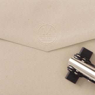 Embossers with vintage seal and custom monogram.