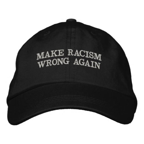 Embroided cap reads Make racism wrong again